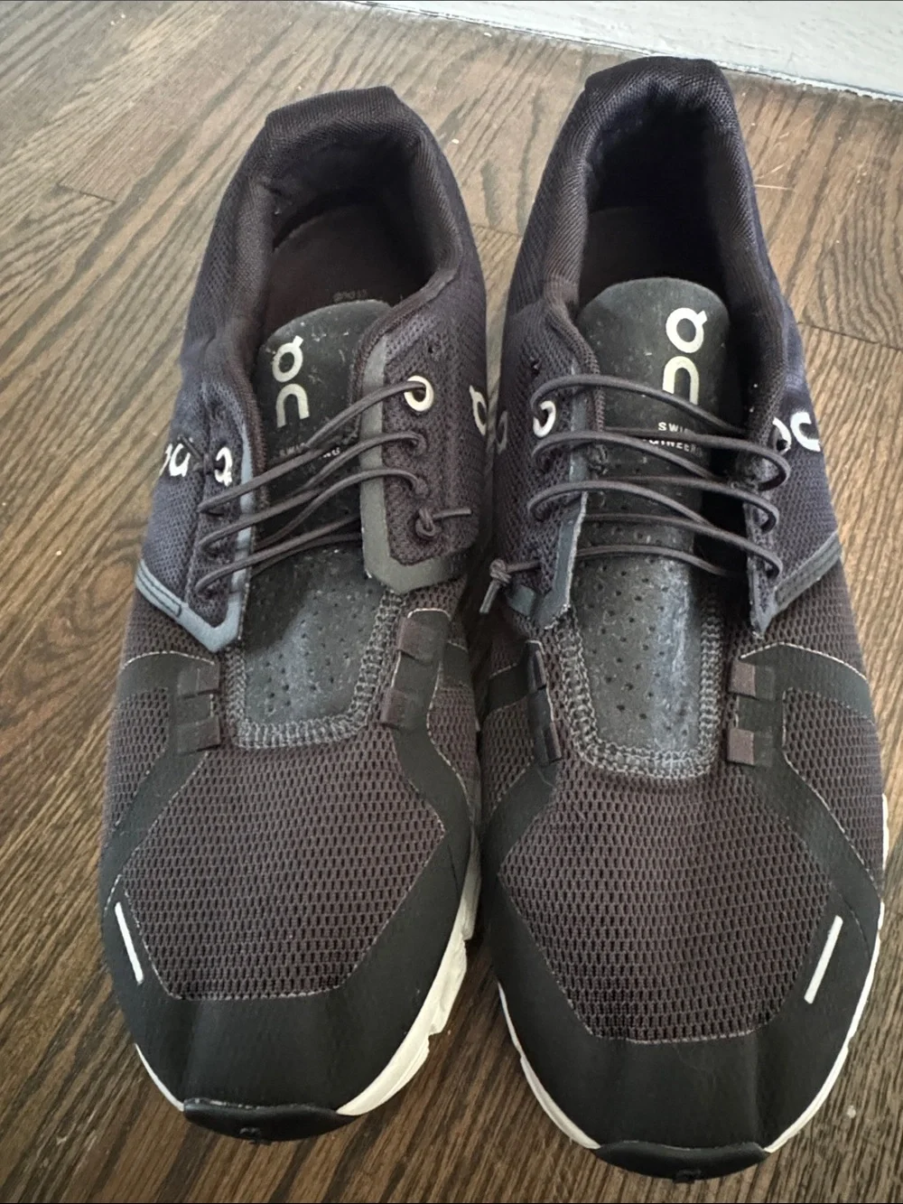 On Running Men's Athletic Sneakers in Black and White size 10